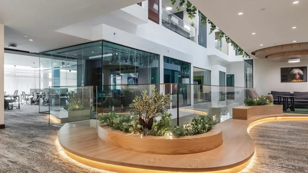 Modern office with greenery and glass